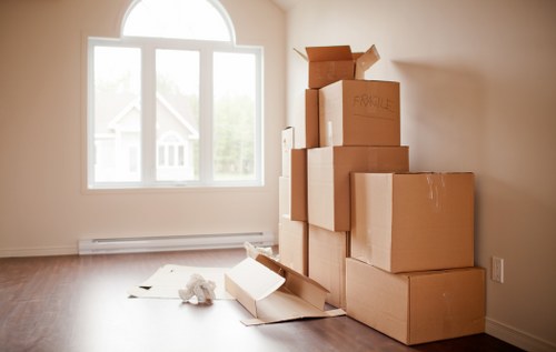 Packed boxes and furniture ready for a Romford removal