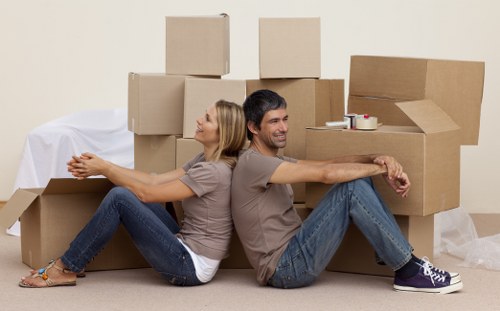Furniture and boxes being loaded for a Romford home move