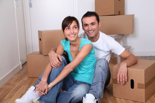 A local removals team handling a flat move in Romford