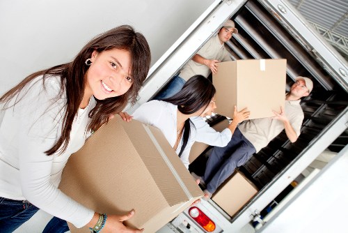 Packed office boxes and equipment ready for transport