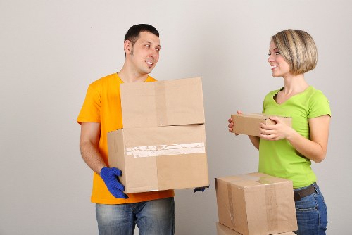 Moving team handling office furniture in Romford